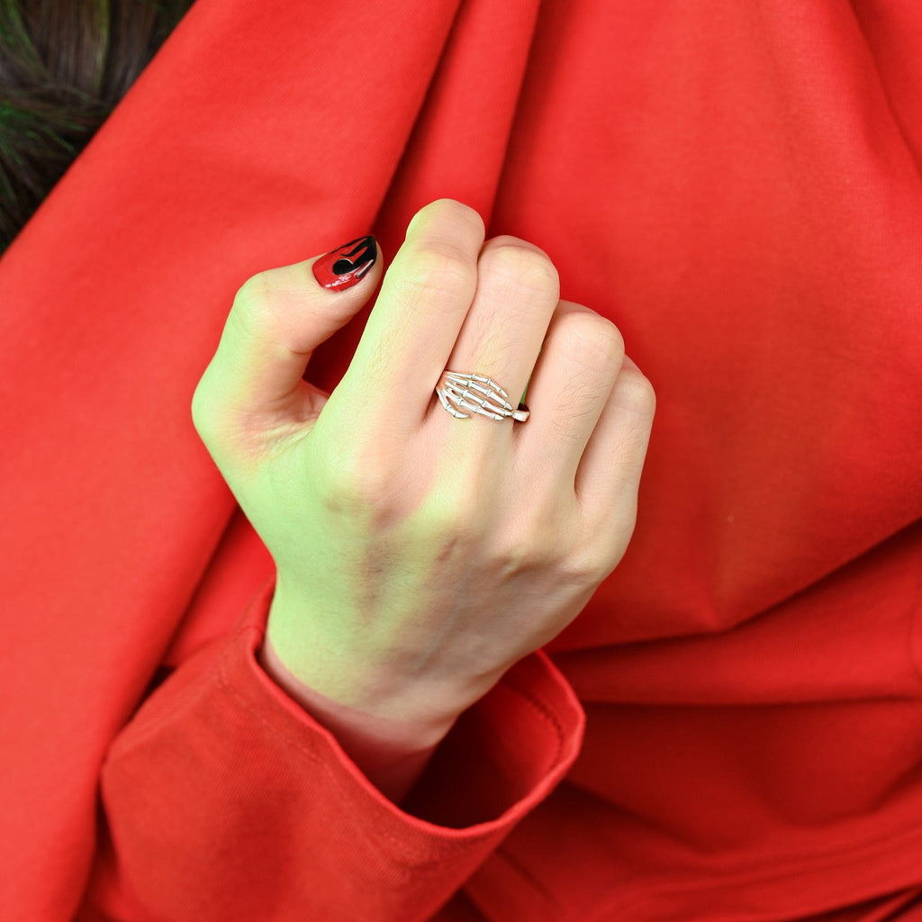 Skeleton Hand Ringing Bell Sterling Silver Skeleton Hand Ring - Eleganzia Jewelry